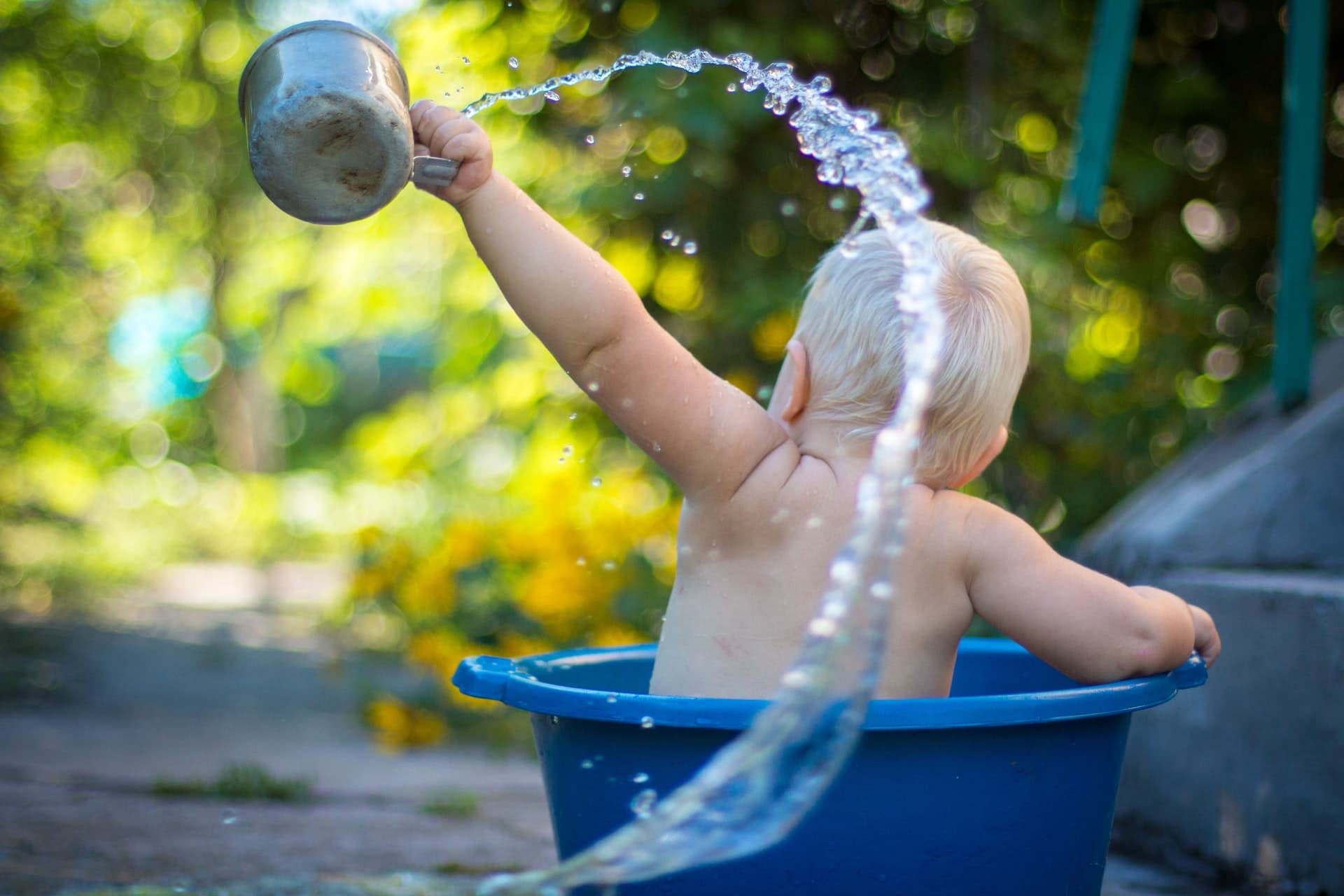 Child splashing water